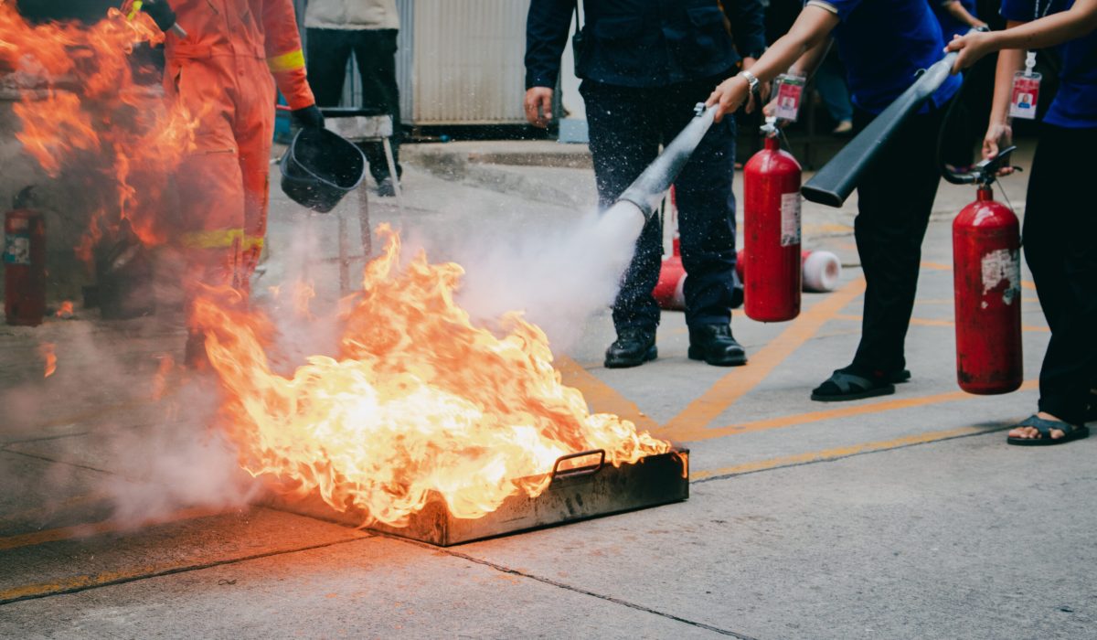 Employees firefighting training,Extinguish a fire.